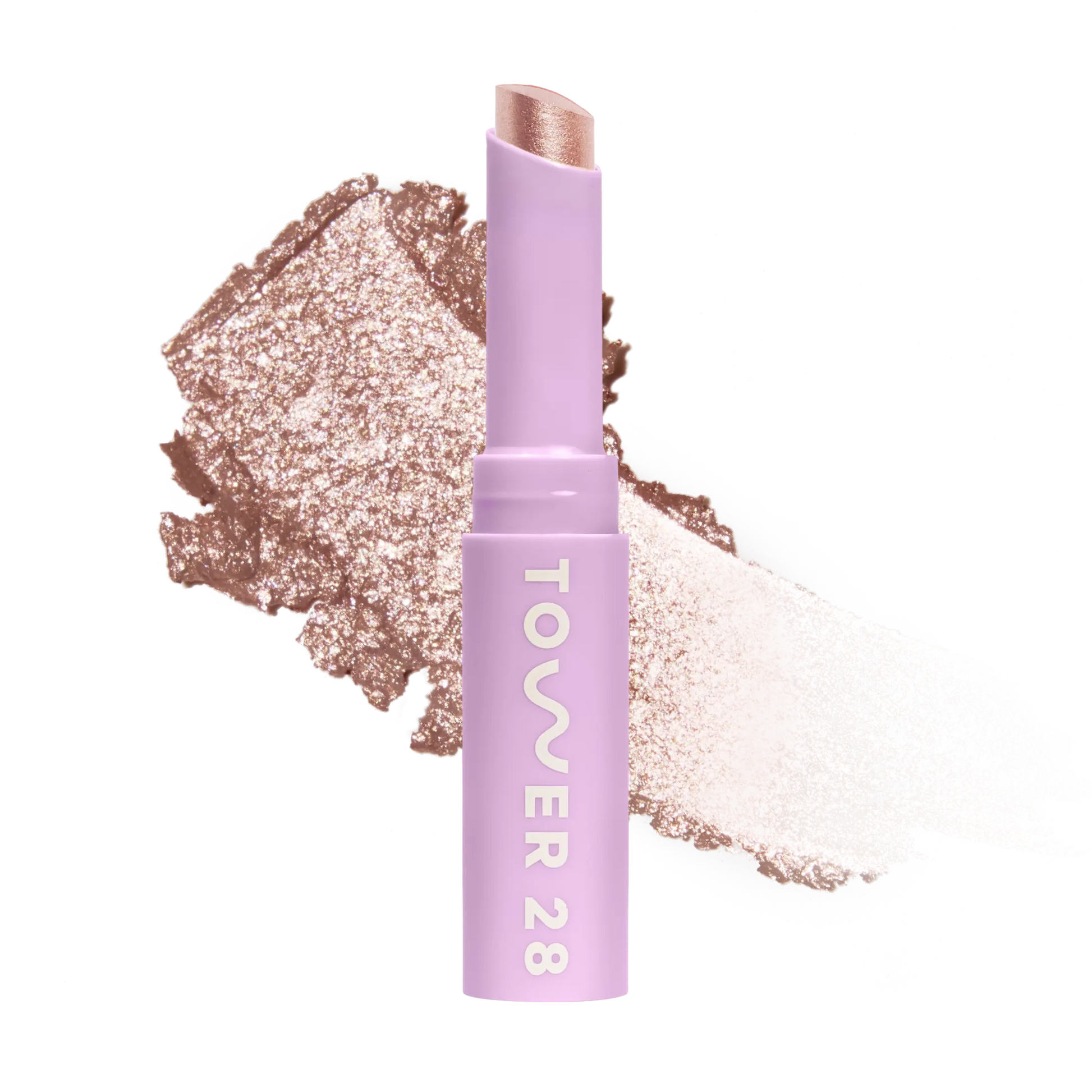 Eyeshadow with glittery texture and 'Tower 28' branding on a white background [Roxy]